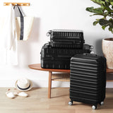AmazonBasics Premium Luggage, Hardside Spinner Travel Suitcase with Wheels - Black
