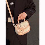 2023 new bag cute junior high school student saddle bag Japanese biscuit off-white hand-held single shoulder Messenger bag female spring