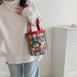 Cute graffiti bucket bag ins print cylinder bag canvas bento bag Korean style girl hand carrying lunch box mommy bag