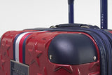 Tommy Hilfiger Starlight 21" Expandable Hardside Spinner, Red