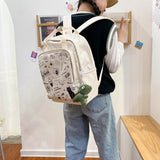 2021 new simple doodle book bag high school college students trend shoulder bag Oxford spun large capacity men and women backpack