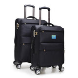 Travel Tale Durable, High-Grade Canvas Rolling Luggage Spinner Brand Military Style Business Travel